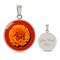 Marigold Birth Flower October Graphic Epoxy Disc Necklace. Clear shiny epoxy shows an orange petal flower on a darker red background. The jewellery is made of high quality surgical steel or with an 18k gold finish option with an option to engrave a short love you message or special date. Luxury Necklace: 18-22" (45-56cm) adjustable
Circle Pendant: 0.9” x 0.9” (23.5mm x 23.5mm)