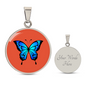 Stunning Blue Butterfly Personalised Engraved Circle Necklace on terracotta orange background. Polished surgical steel or with an 18k gold finish option. Necklace: 18-22" adjustable.
Circle Pendant: 0.9” x 0.9” (23.5mm x 23.5mm)