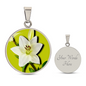 Lily Birth Flower May Graphic Epoxy Disc Necklace. Clear shiny epoxy shows a white petal flower with green stem on a lime green background. The jewellery is made of high quality surgical steel or with an 18k gold finish option with an option to engrave a short love you message or special date. Luxury Necklace: 18-22" (45-56cm) adjustable
Circle Pendant: 0.9” x 0.9” (23.5mm x 23.5mm)