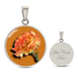 Carnation Birth Flower January Graphic Epoxy Disc Necklace. Clear shiny epoxy shows an orange flower on a green stalk with a darker orange background. The jewellery is made of high quality surgical steel or with an 18k gold finish option with an option to engrave a short love you message or special date. Luxury Necklace: 18-22" (45-56cm) adjustable
Circle Pendant: 0.9” x 0.9” (23.5mm x 23.5mm)