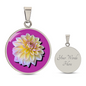 Aster Birth Flower September Graphic Epoxy Disc Necklace. Clear shiny epoxy shows a light yellow petal flower on a lighter pink background. The jewellery is made of high quality surgical steel or with an 18k gold finish option with an option to engrave a short love you message or special date. Luxury Necklace: 18-22" (45-56cm) adjustable
Circle Pendant: 0.9” x 0.9” (23.5mm x 23.5mm)