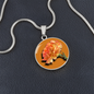 Carnation Birth Flower January Graphic Epoxy Disc Necklace. Clear shiny epoxy shows an orange flower on a green stalk with a darker orange background. The jewellery is made of high quality surgical steel or with an 18k gold finish option with an option to engrave a short love you message or special date. Luxury Necklace: 18-22" (45-56cm) adjustable
Circle Pendant: 0.9” x 0.9” (23.5mm x 23.5mm)