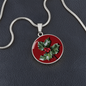 Holly Birth Flower December Graphic Epoxy Disc Necklace. Clear shiny epoxy shows a red berry on green spikey leaf with a darker red background. The jewellery is made of high quality surgical steel or with an 18k gold finish option with an option to engrave a short love you message or special date. Luxury Necklace: 18-22" (45-56cm) adjustable
Circle Pendant: 0.9” x 0.9” (23.5mm x 23.5mm)