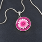 Chrysanthemums Birth Flower November Graphic Epoxy Disc Necklace. Clear shiny epoxy shows a two tone light pink petal flower on a darker pink background. The jewellery is made of high quality surgical steel or with an 18k gold finish option with an option to engrave a short love you message or special date. Luxury Necklace: 18-22" (45-56cm) adjustable
Circle Pendant: 0.9” x 0.9” (23.5mm x 23.5mm)