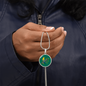 Colourful Bird Personalized Engraved Circle Necklace on emerald green background. Polished surgical steel or with an 18k gold finish option. Necklace: 18-22" adjustable.
Circle Pendant: 0.9” x 0.9” (23.5mm x 23.5mm)