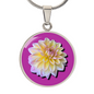 Aster Birth Flower September Graphic Epoxy Disc Necklace. Clear shiny epoxy shows a light yellow petal flower on a lighter pink background. The jewellery is made of high quality surgical steel or with an 18k gold finish option with an option to engrave a short love you message or special date. Luxury Necklace: 18-22" (45-56cm) adjustable
Circle Pendant: 0.9” x 0.9” (23.5mm x 23.5mm)