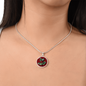 Holly Birth Flower December Graphic Epoxy Disc Necklace. Clear shiny epoxy shows a red berry on green spikey leaf with a darker red background. The jewellery is made of high quality surgical steel or with an 18k gold finish option with an option to engrave a short love you message or special date. Luxury Necklace: 18-22" (45-56cm) adjustable
Circle Pendant: 0.9” x 0.9” (23.5mm x 23.5mm)