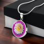 Aster Birth Flower September Graphic Epoxy Disc Necklace. Clear shiny epoxy shows a light yellow petal flower on a lighter pink background. The jewellery is made of high quality surgical steel or with an 18k gold finish option with an option to engrave a short love you message or special date. Luxury Necklace: 18-22" (45-56cm) adjustable
Circle Pendant: 0.9” x 0.9” (23.5mm x 23.5mm)