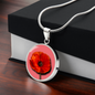 Poppy Birth Flower August Graphic Epoxy Disc Necklace. Clear shiny epoxy shows a red petal flower with a dark canter on a lighter pink background. The jewellery is made of high quality surgical steel or with an 18k gold finish option with an option to engrave a short love you message or special date. Luxury Necklace: 18-22" (45-56cm) adjustable
Circle Pendant: 0.9” x 0.9” (23.5mm x 23.5mm)