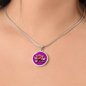 Water Lily Birth Flower July Graphic Epoxy Disc Necklace. Clear shiny epoxy shows a light pink petal flower on a darker pink background. The jewellery is made of high quality surgical steel or with an 18k gold finish option with an option to engrave a short love you message or special date. Luxury Necklace: 18-22" (45-56cm) adjustable
Circle Pendant: 0.9” x 0.9” (23.5mm x 23.5mm)