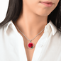 Rose Birth Flower June Graphic Epoxy Disc Necklace. Clear shiny epoxy shows a red petal flower and green stem on a pink background. The jewellery is made of high quality surgical steel or with an 18k gold finish option with an option to engrave a short love you message or special date. Luxury Necklace: 18-22" (45-56cm) adjustable
Circle Pendant: 0.9” x 0.9” (23.5mm x 23.5mm)