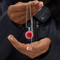 Rose Birth Flower June Graphic Epoxy Disc Necklace. Clear shiny epoxy shows a red petal flower and green stem on a pink background. The jewellery is made of high quality surgical steel or with an 18k gold finish option with an option to engrave a short love you message or special date. Luxury Necklace: 18-22" (45-56cm) adjustable
Circle Pendant: 0.9” x 0.9” (23.5mm x 23.5mm)