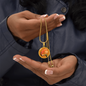 Carnation Birth Flower January Graphic Epoxy Disc Necklace. Clear shiny epoxy shows an orange flower on a green stalk with a darker orange background. The jewellery is made of high quality surgical steel or with an 18k gold finish option with an option to engrave a short love you message or special date. Luxury Necklace: 18-22" (45-56cm) adjustable
Circle Pendant: 0.9” x 0.9” (23.5mm x 23.5mm)