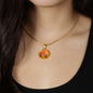 Carnation Birth Flower January Graphic Epoxy Disc Necklace. Clear shiny epoxy shows an orange flower on a green stalk with a darker orange background. The jewellery is made of high quality surgical steel or with an 18k gold finish option with an option to engrave a short love you message or special date. Luxury Necklace: 18-22" (45-56cm) adjustable
Circle Pendant: 0.9” x 0.9” (23.5mm x 23.5mm)