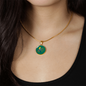 Colourful Bird Personalized Engraved Circle Necklace on emerald green background. Polished surgical steel or with an 18k gold finish option. Necklace: 18-22" adjustable.
Circle Pendant: 0.9” x 0.9” (23.5mm x 23.5mm)
