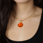 Marigold Birth Flower October Graphic Epoxy Disc Necklace. Clear shiny epoxy shows an orange petal flower on a darker red background. The jewellery is made of high quality surgical steel or with an 18k gold finish option with an option to engrave a short love you message or special date. Luxury Necklace: 18-22" (45-56cm) adjustable
Circle Pendant: 0.9” x 0.9” (23.5mm x 23.5mm)