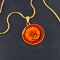 Marigold Birth Flower October Graphic Epoxy Disc Necklace. Clear shiny epoxy shows an orange petal flower on a darker red background. The jewellery is made of high quality surgical steel or with an 18k gold finish option with an option to engrave a short love you message or special date. Luxury Necklace: 18-22" (45-56cm) adjustable
Circle Pendant: 0.9” x 0.9” (23.5mm x 23.5mm)