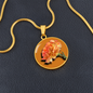 Carnation Birth Flower January Graphic Epoxy Disc Necklace. Clear shiny epoxy shows an orange flower on a green stalk with a darker orange background. The jewellery is made of high quality surgical steel or with an 18k gold finish option with an option to engrave a short love you message or special date. Luxury Necklace: 18-22" (45-56cm) adjustable
Circle Pendant: 0.9” x 0.9” (23.5mm x 23.5mm)