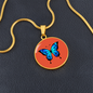 Stunning Blue Butterfly Personalised Engraved Circle Necklace on terracotta orange background. Polished surgical steel or with an 18k gold finish option. Necklace: 18-22" adjustable.
Circle Pendant: 0.9” x 0.9” (23.5mm x 23.5mm)