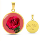 Rose Birth Flower June Graphic Epoxy Disc Necklace. Clear shiny epoxy shows a red petal flower and green stem on a pink background. The jewellery is made of high quality surgical steel or with an 18k gold finish option with an option to engrave a short love you message or special date. Luxury Necklace: 18-22" (45-56cm) adjustable
Circle Pendant: 0.9” x 0.9” (23.5mm x 23.5mm)