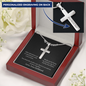 Cross Engraved Pendant With Snake Chain Necklace for your boyfriend. Crafted in high polished stainless steel, this piece will resist tarnishing and is hypoallergenic for sensitive skin. Includes a luxury adjustable snake chain (18" - 22") and attaches with an easy to use lobster clasp.