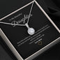 Dazzling Eternal Hope Necklace features a cushion cut centre cubic zirconia and centre crystal is adorned with equally brilliant CZ crystals. 14k white gold finish over stainless steel 8mm cushion-cut centre cubic zirconia crystal