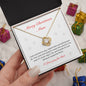 The Best Christmas Gift For Mom. Happy Christmas Mom Love Knot Necklace with heartfelt message. 14k white gold or 18k yellow gold finish.