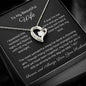 Dazzling Forever Love Necklace and heartfelt message card. This necklace features a stunning 6.5mm CZ crystal surrounded by a polished heart pendant embellished with smaller crystals. 14k white gold finish with adjustable chain length: 18" - 22" (45.72cm - 55.88cm)