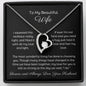 Dazzling Forever Love Necklace and heartfelt message card. This necklace features a stunning 6.5mm CZ crystal surrounded by a polished heart pendant embellished with smaller crystals. 14k white gold finish with adjustable chain length: 18" - 22" (45.72cm - 55.88cm)