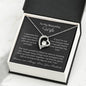 Dazzling Forever Love Necklace and heartfelt message card. This necklace features a stunning 6.5mm CZ crystal surrounded by a polished heart pendant embellished with smaller crystals. 14k white gold finish with adjustable chain length: 18" - 22" (45.72cm - 55.88cm)
