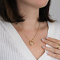 Heart pendant 14k white gold finish or 18k yellow gold finish 6.5mm round cut cubic zirconia stone