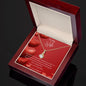 To My Wife Ribbon Shaped Pendant Necklace features a beautiful pendant embellished with premium cubic zirconia crystals. 14k white gold over stainless steel or 18k yellow gold over stainless steel with a heartfelt message card.