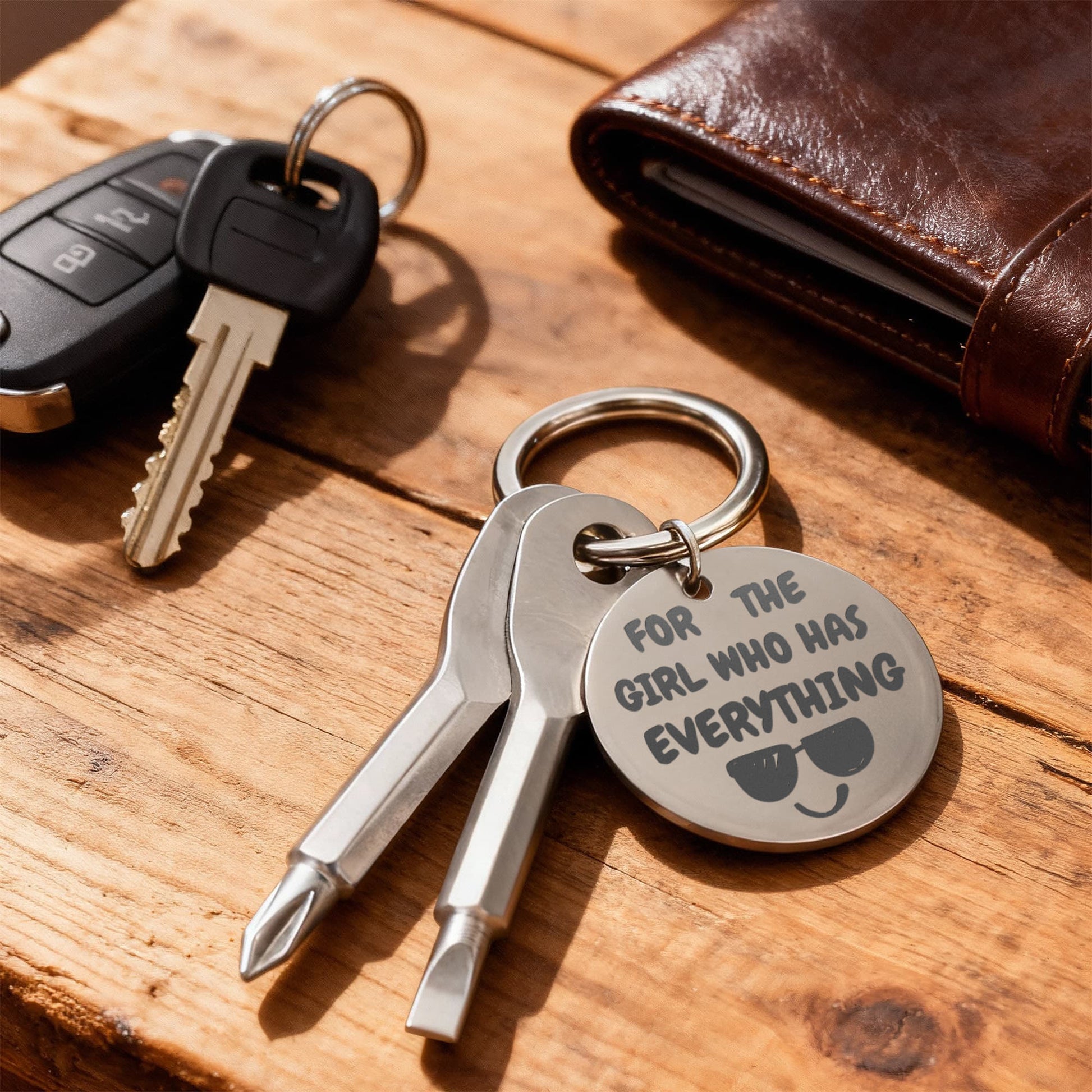 Engraved keychain screwdriver for your Girl with flathead and Philips. Cheeky message reads For the girl who has everything! Add your own engraved message on the back. Colour Black or Silver.