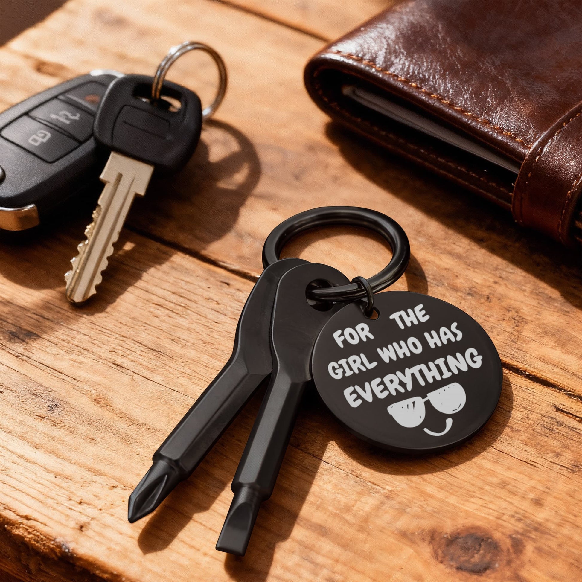 Engraved keychain screwdriver for your Girl with flathead and Philips. Cheeky message reads For the girl who has everything! Add your own engraved message on the back. Colour Black or Silver.