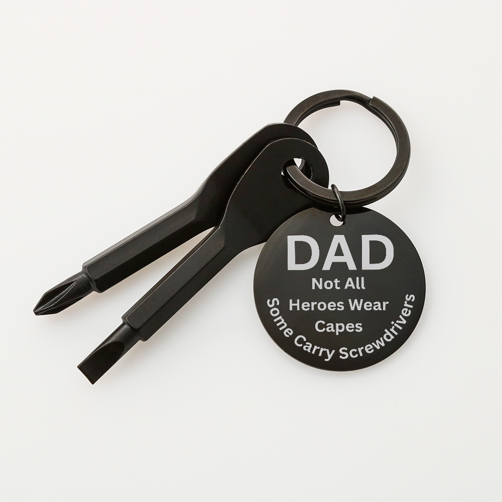 Engraved  keychain screwdriver for DAD with flathead and Philips. Message reads DAD not all heroes wear capes, some carry screwdrivers. Add your own engraved message on the back. Colour Black or Silver.