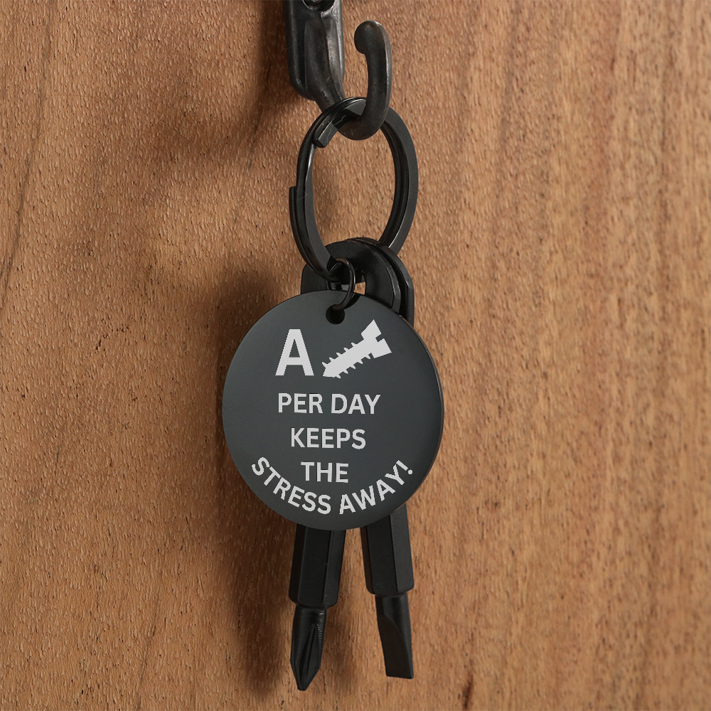 Engraved keychain screwdriver for your guy or gal with flathead and Philips. Message reads A screw per day keeps your stress away. Add your own engraved message on the back. Colour Black or Silver.