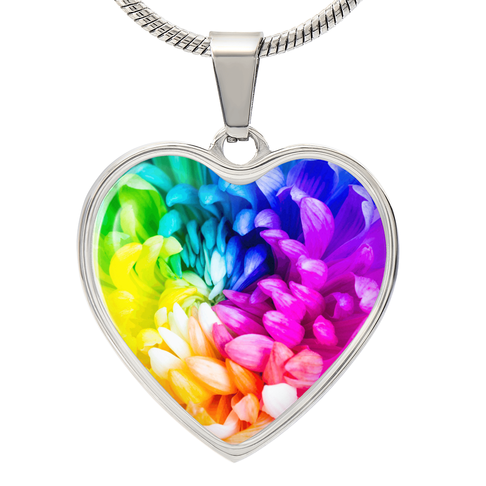 Rainbow Flower Graphic Necklace. A rainbow flower symbolises joy, diversity, and hope. Because of its vibrant mix of colours, it represents happiness, positivity, and inclusivity. Our patent-pending jewellery is made of high quality surgical steel or with an 18k gold finish option. Perfect Gift For:
Birthdays & Anniversaries
Pride Celebrations 
Mother’s Day & Valentine’s Day
Someone who brightens your life!