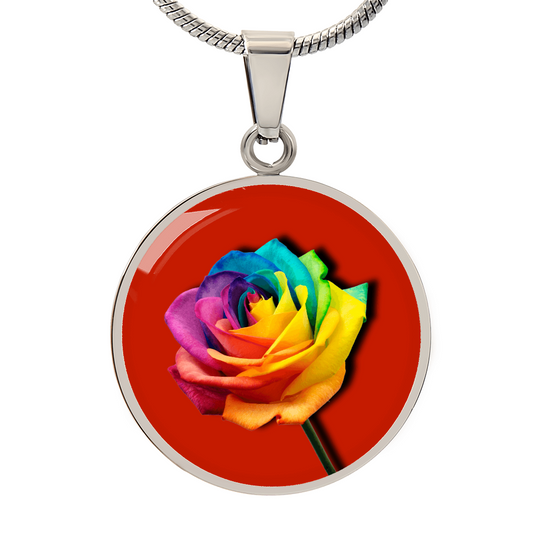 Rainbow Rose Graphic Necklace. A rainbow rose symbolises joy, diversity, and hope. Because of its vibrant mix of colours, it represents happiness, positivity, and inclusivity. Our patent-pending jewellery is made of high quality surgical steel or with an 18k gold finish option. Perfect Gift For:
Birthdays & Anniversaries
Pride Celebrations 
Mother’s Day & Valentine’s Day
Someone who brightens your life!