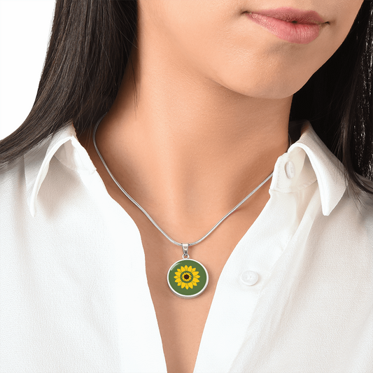 Summer Sunflower on dill green background disc Necklace,  Personalized Engraved Circle Necklace. Polished surgical steel or with an 18k gold finish option. Necklace: 18-22" adjustable.
Circle Pendant: 0.9” x 0.9” (23.5mm x 23.5mm)