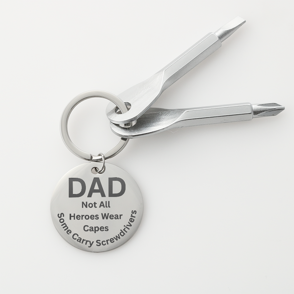 Engraved  keychain screwdriver for DAD with flathead and Philips. Message reads DAD not all heroes wear capes, some carry screwdrivers. Add your own engraved message on the back. Colour Black or Silver.