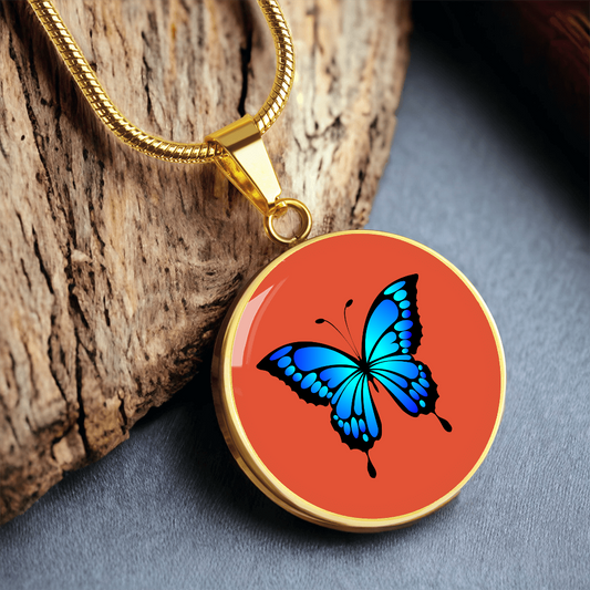 Stunning Blue Butterfly Personalised Engraved Circle Necklace on terracotta orange background. Polished surgical steel or with an 18k gold finish option. Necklace: 18-22" adjustable.
Circle Pendant: 0.9” x 0.9” (23.5mm x 23.5mm)