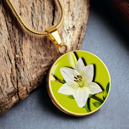 Lily Birth Flower May Graphic Epoxy Disc Necklace. Clear shiny epoxy shows a white petal flower with green stem on a lime green background. The jewellery is made of high quality surgical steel or with an 18k gold finish option with an option to engrave a short love you message or special date. Luxury Necklace: 18-22" (45-56cm) adjustable
Circle Pendant: 0.9” x 0.9” (23.5mm x 23.5mm)