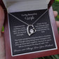 Dazzling Forever Love Necklace and heartfelt message card. This necklace features a stunning 6.5mm CZ crystal surrounded by a polished heart pendant embellished with smaller crystals. 14k white gold finish with adjustable chain length: 18" - 22" (45.72cm - 55.88cm)