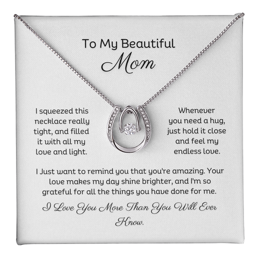 Mom horseshoe pendant necklace with  Cubic Zirconia centre stone in white gold finish, box chain and a heartfelt message card.