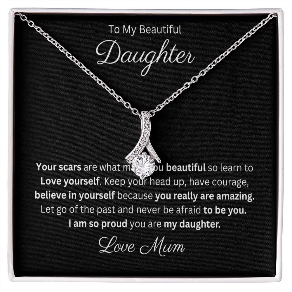 Petite Ribbon Pendant Necklace 14k white gold finish or 18k yellow gold finish over stainless steel with 7mm cubic zirconia 