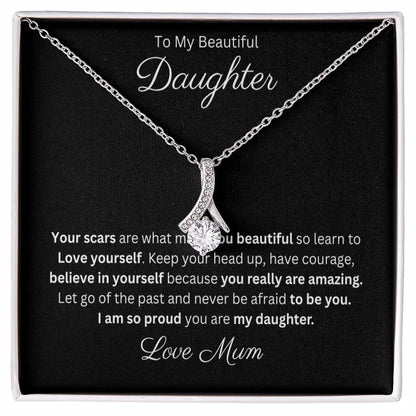 Petite Ribbon Pendant Necklace 14k white gold finish or 18k yellow gold finish over stainless steel with 7mm cubic zirconia 