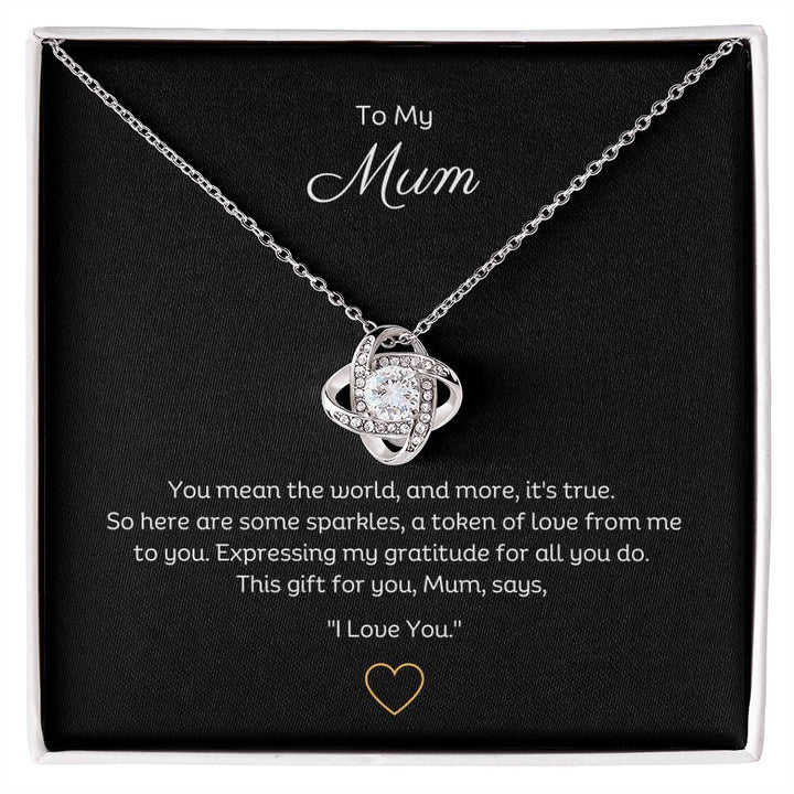 To My Mum, Beautiful Love Knot 14k or 18k finish Necklace. Features a beautiful pendant embellished with premium cubic zirconia crystals.