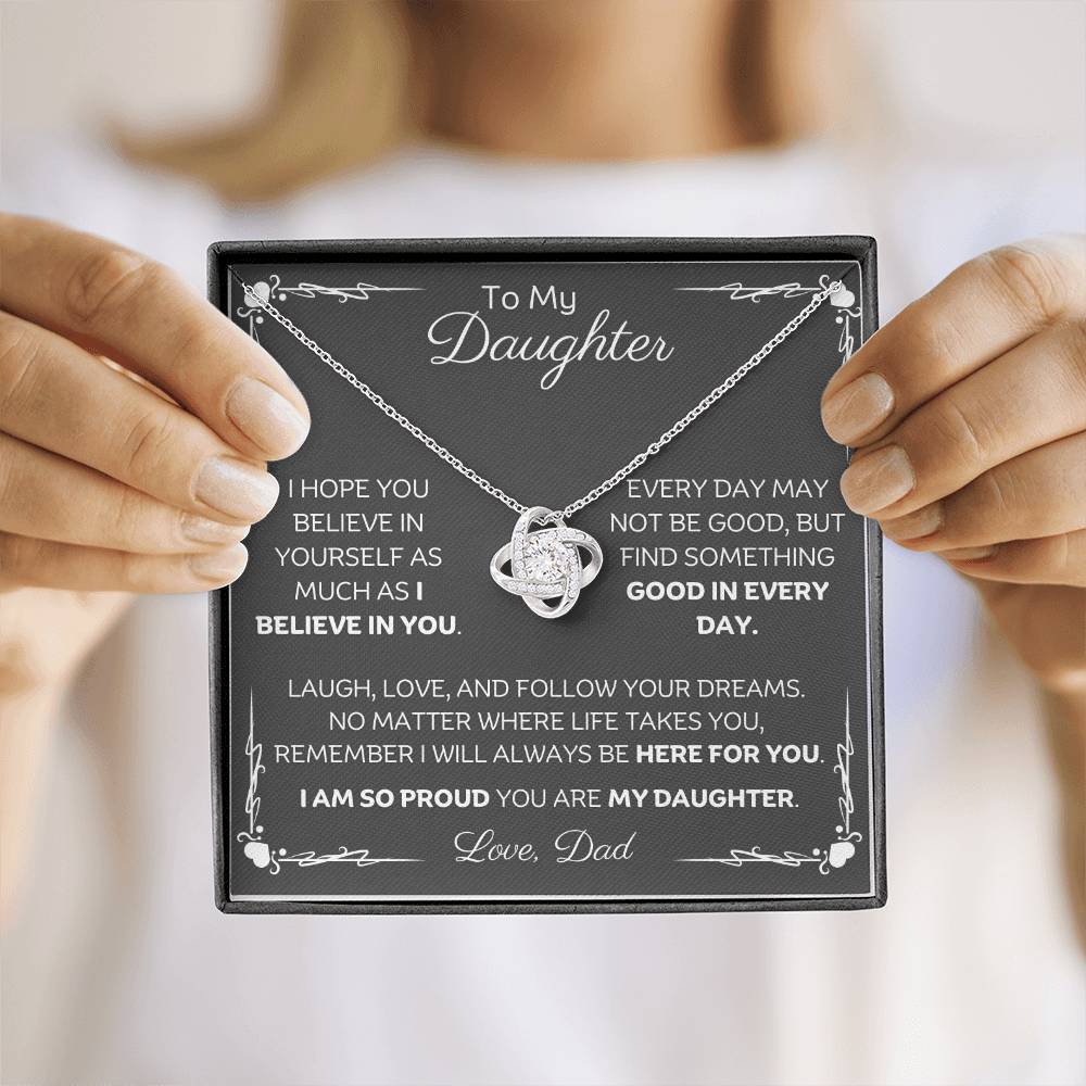 To My Daughter Love Knot Necklace with heartfelt message card and gift box love from Dad. 14k white gold over stainless steel embellished with premium cubic zirconia crystals. Adjustable chain length: 18" - 22" (45.72cm - 55.88cm)