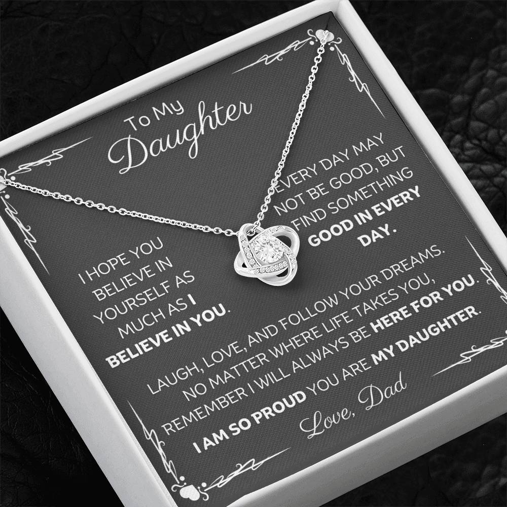 To My Daughter Love Knot Necklace with heartfelt message card and gift box love from Dad. 14k white gold over stainless steel embellished with premium cubic zirconia crystals. Adjustable chain length: 18" - 22" (45.72cm - 55.88cm)