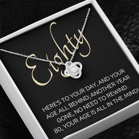 80th Birthday, Beautiful Love Knot 14k or 18k finish Necklace. Features a beautiful pendant embellished with premium cubic zirconia crystals and heartfelt message card